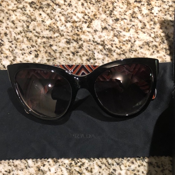 Prada Accessories - Prada women’s patterned sunglasses PRICE FIRM